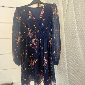 Quarter length sheer sleeve floral mini dress